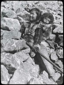 Image of Ah-nee-nah and Baby on Rocks
